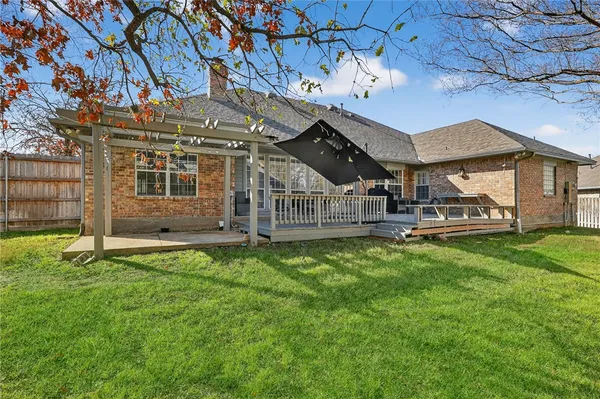a view of a porch with a yard