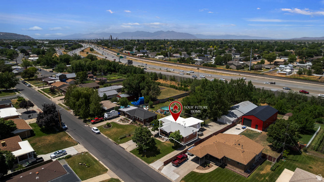 1489 North 400 West Bountiful, UT 84010 - Photo 42 of 47 Single-story property featuring a light-colored roof and brick exterior