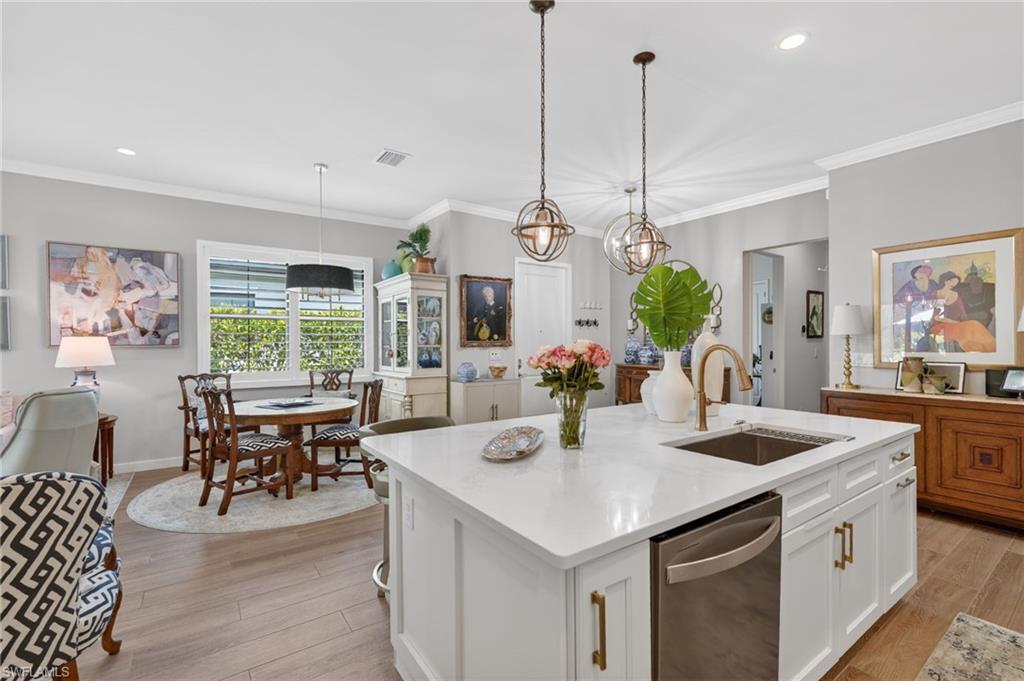 14628 Kingfisher Loop Naples, FL 34120 - Photo 11 of 39 a view of dining table and chairs