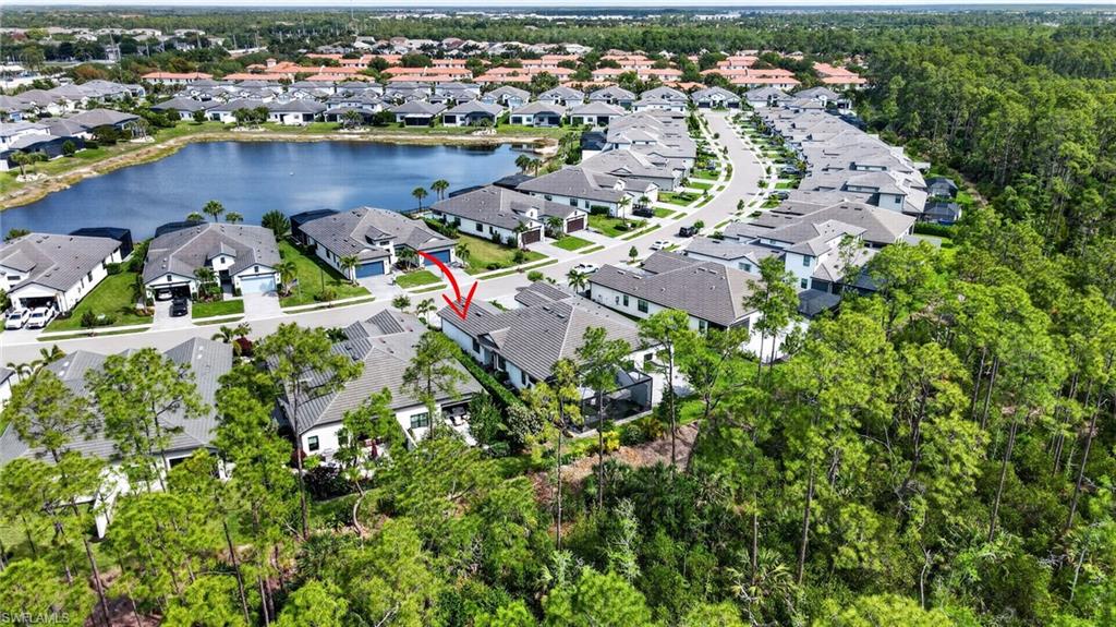 14628 Kingfisher Loop Naples, FL 34120 - Photo 36 of 39 an aerial view of a houses with outdoor space and trees all around