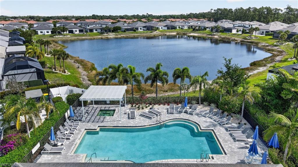 14628 Kingfisher Loop Naples, FL 34120 - Photo 37 of 39 an aerial view of residential house with outdoor space and lake view