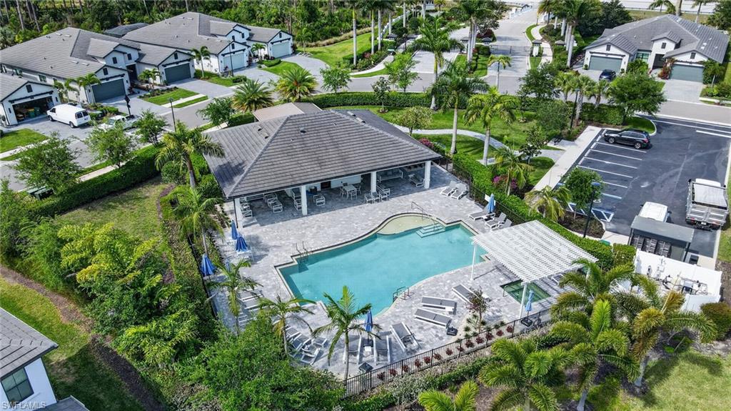 14628 Kingfisher Loop Naples, FL 34120 - Photo 38 of 39 an aerial view of a house with garden space and street view