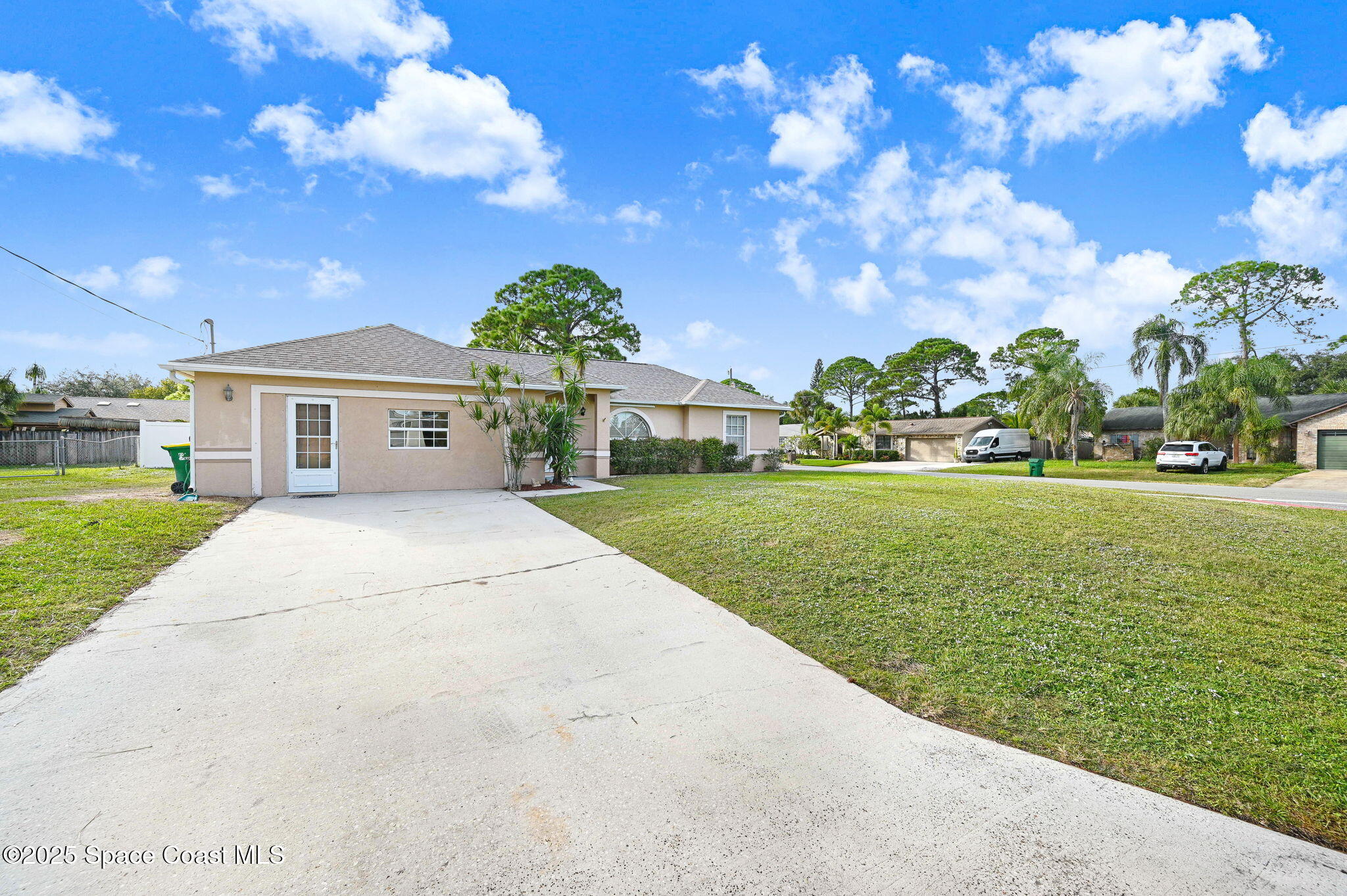 6094 Cardiff Avenue Cocoa, FL 32927 - Photo 45 of 48 a front view of a house with garden