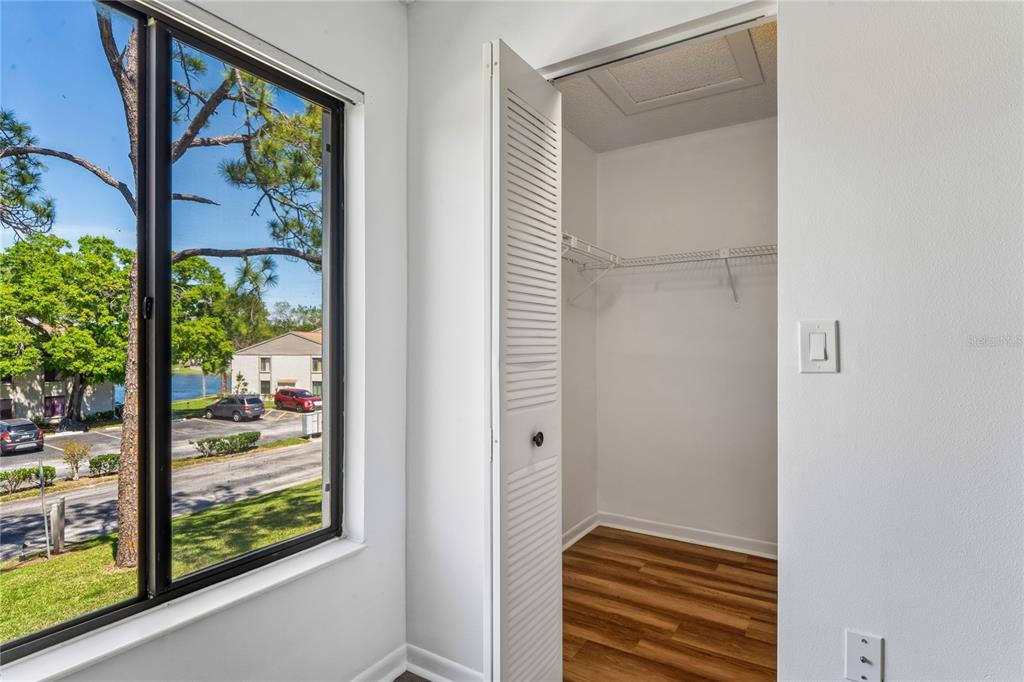 2522 Pine Ridge Way South, Unit D2 Palm Harbor, FL 34684 - Photo 28 of 38 view of room with window