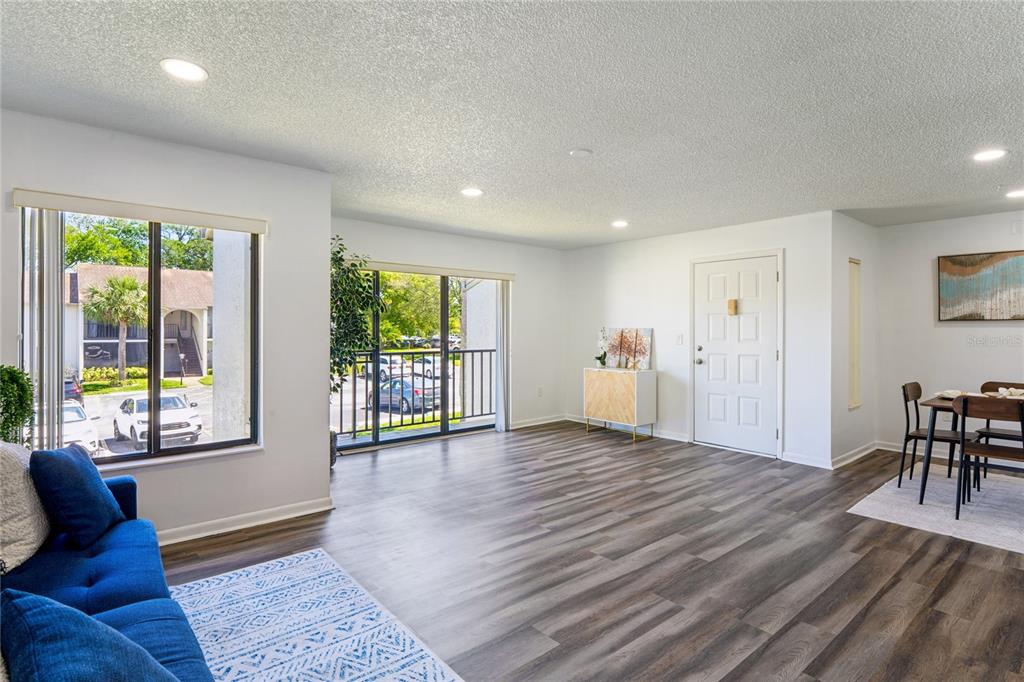 2522 Pine Ridge Way South, Unit D2 Palm Harbor, FL 34684 - Photo 5 of 38 a view of an empty room with a window
