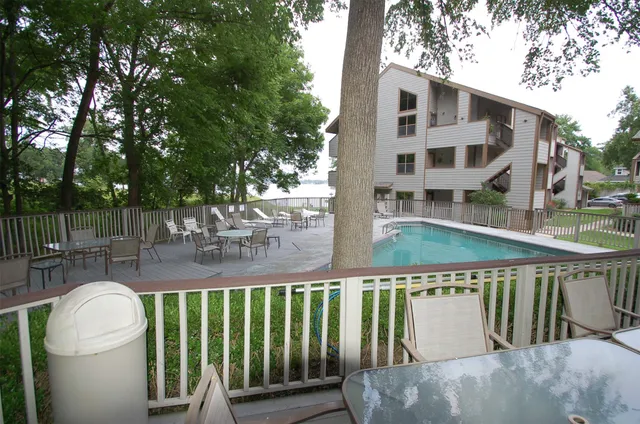 a view of building with outdoor space and seating area