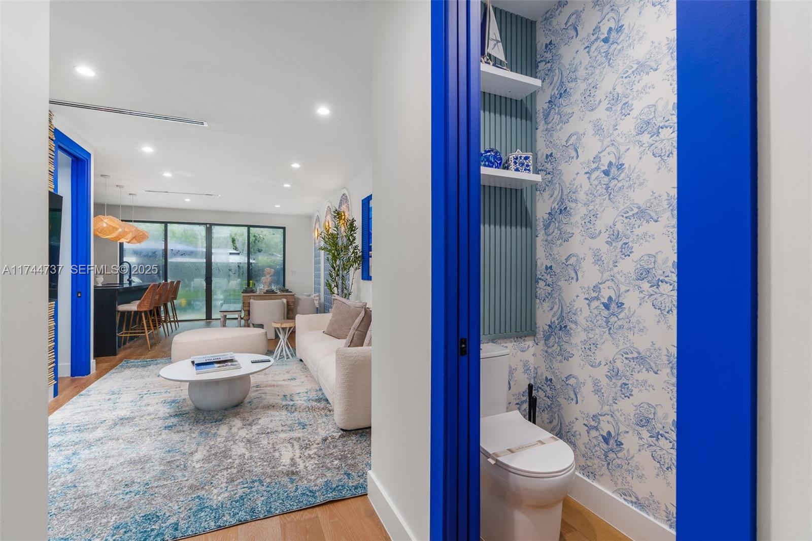 408 Northwest 52nd Street Miami, FL 33127 - Photo 19 of 73 a bathroom with a toilet a sink and a shower