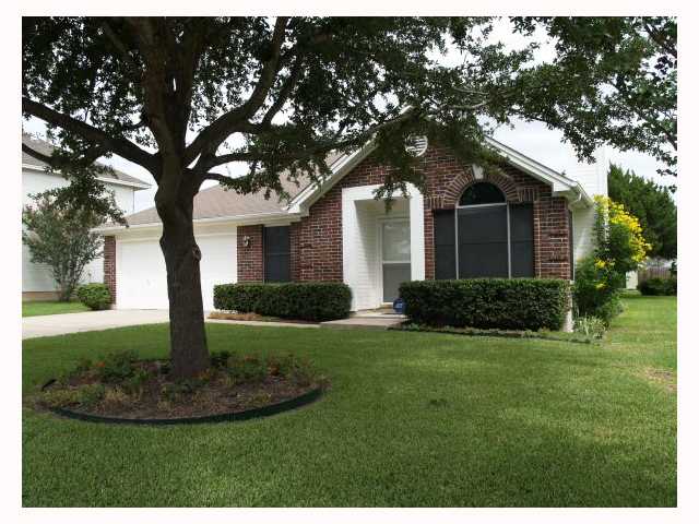 2500 Patsy Parkway Austin, TX 78744 - Photo 1 of 1 a front view of a house with a yard