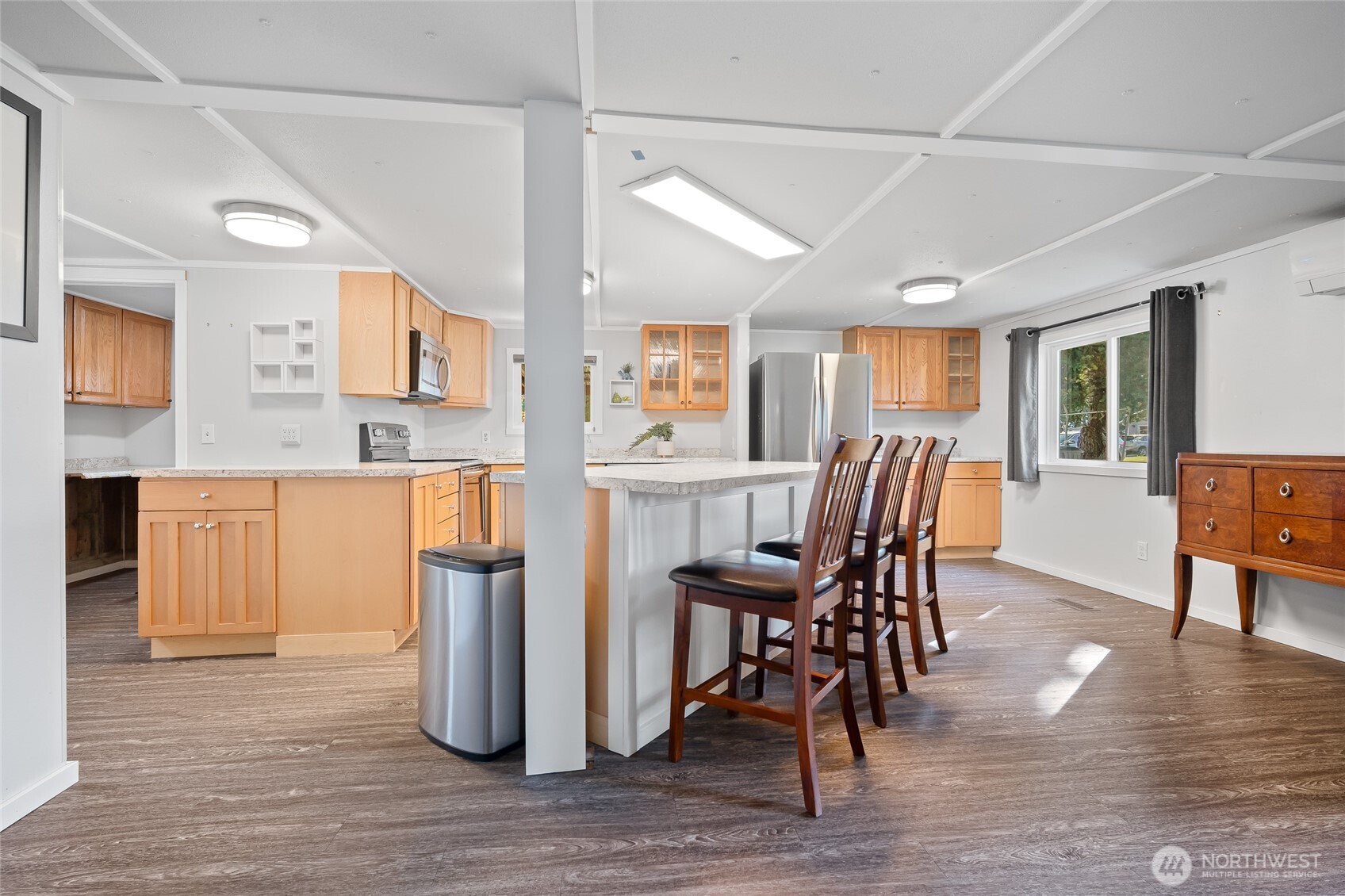 6978 Hannegan Road Lynden, WA 98264 - Photo 15 of 37 a dining room with furniture and wooden floor