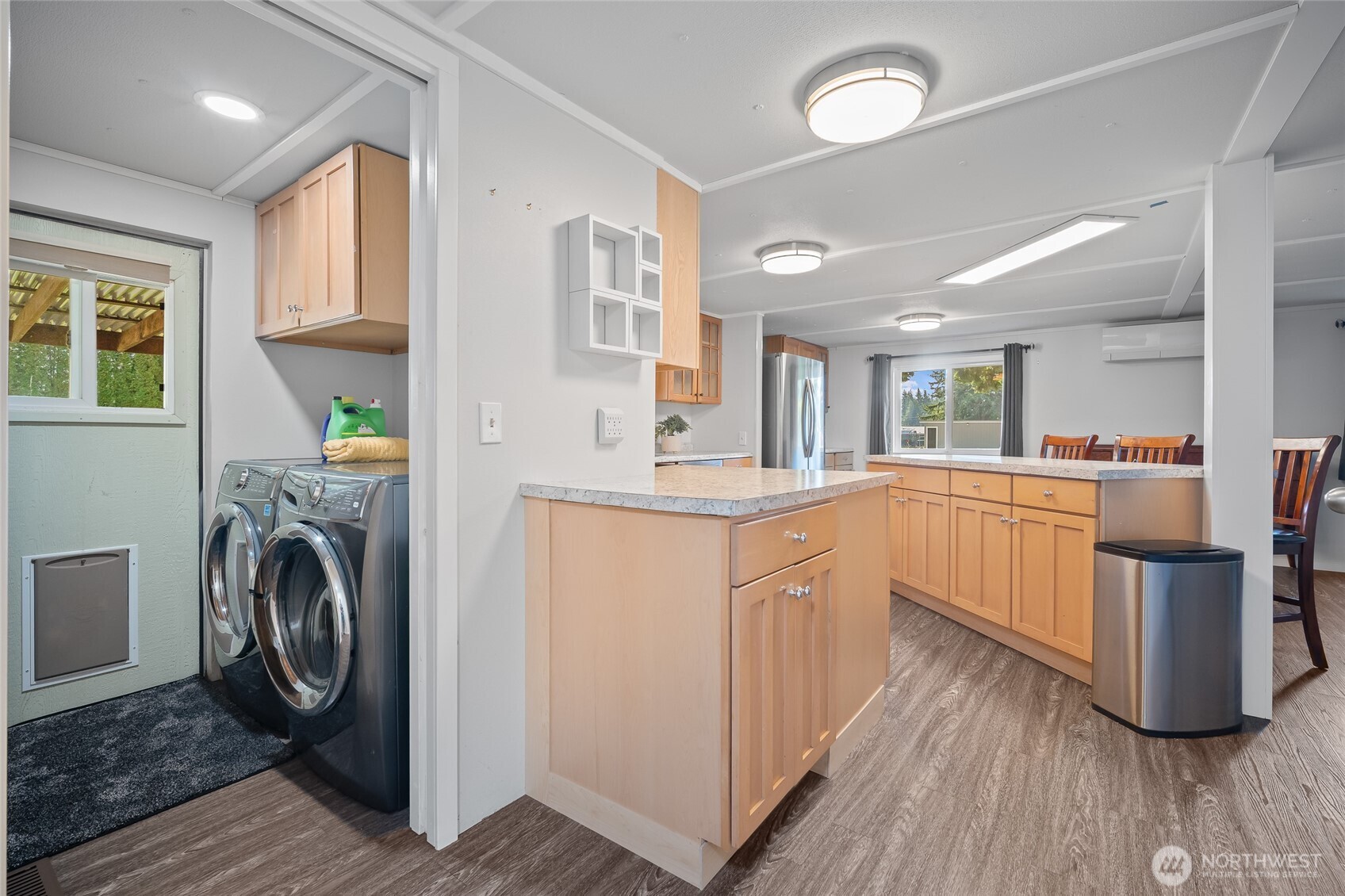 6978 Hannegan Road Lynden, WA 98264 - Photo 16 of 37 a kitchen with a sink a counter top space and stainless steel appliances