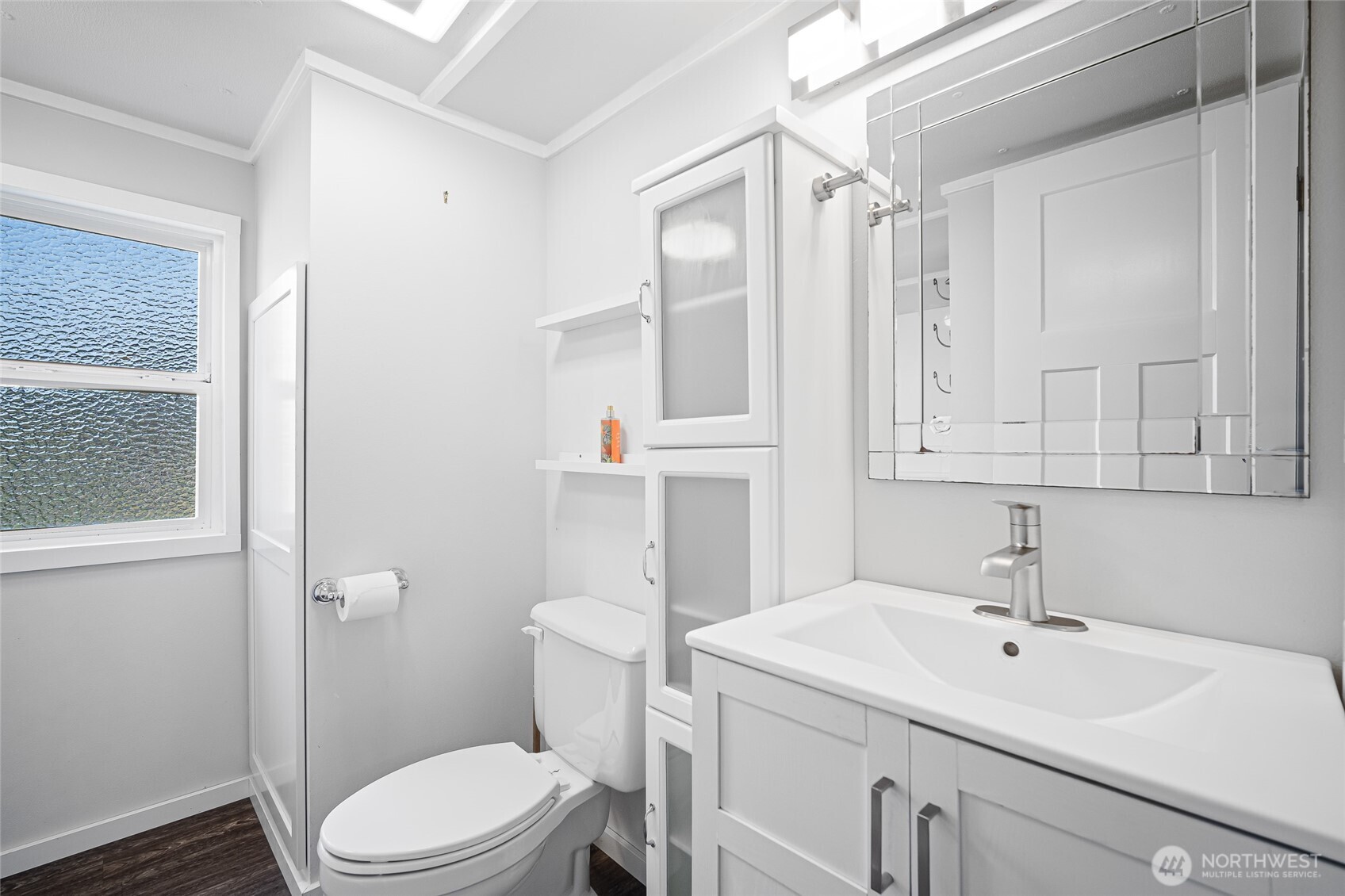 6978 Hannegan Road Lynden, WA 98264 - Photo 22 of 37 a bathroom with a sink a toilet and shower