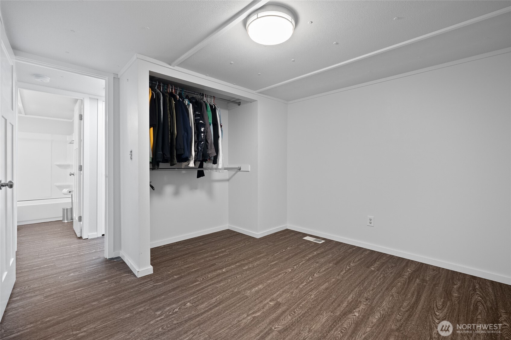 6978 Hannegan Road Lynden, WA 98264 - Photo 24 of 37 wooden floor in an empty room