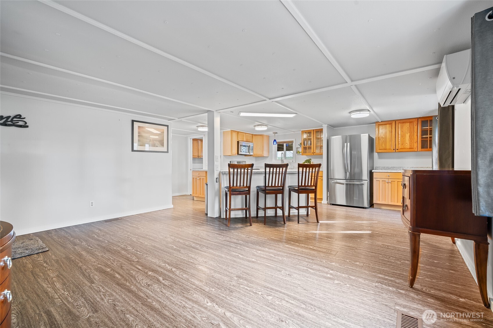6978 Hannegan Road Lynden, WA 98264 - Photo 9 of 37 a view of a livingroom with furniture and wooden floor