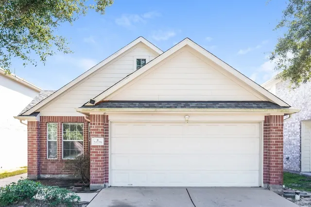 a view of outdoor space garage and yard