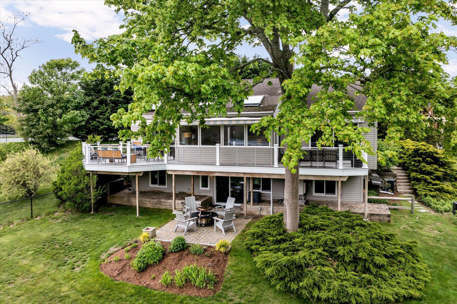 597 Orleans Road North Chatham, MA 02650 - Photo 12 of 76 Rear view deck and trees