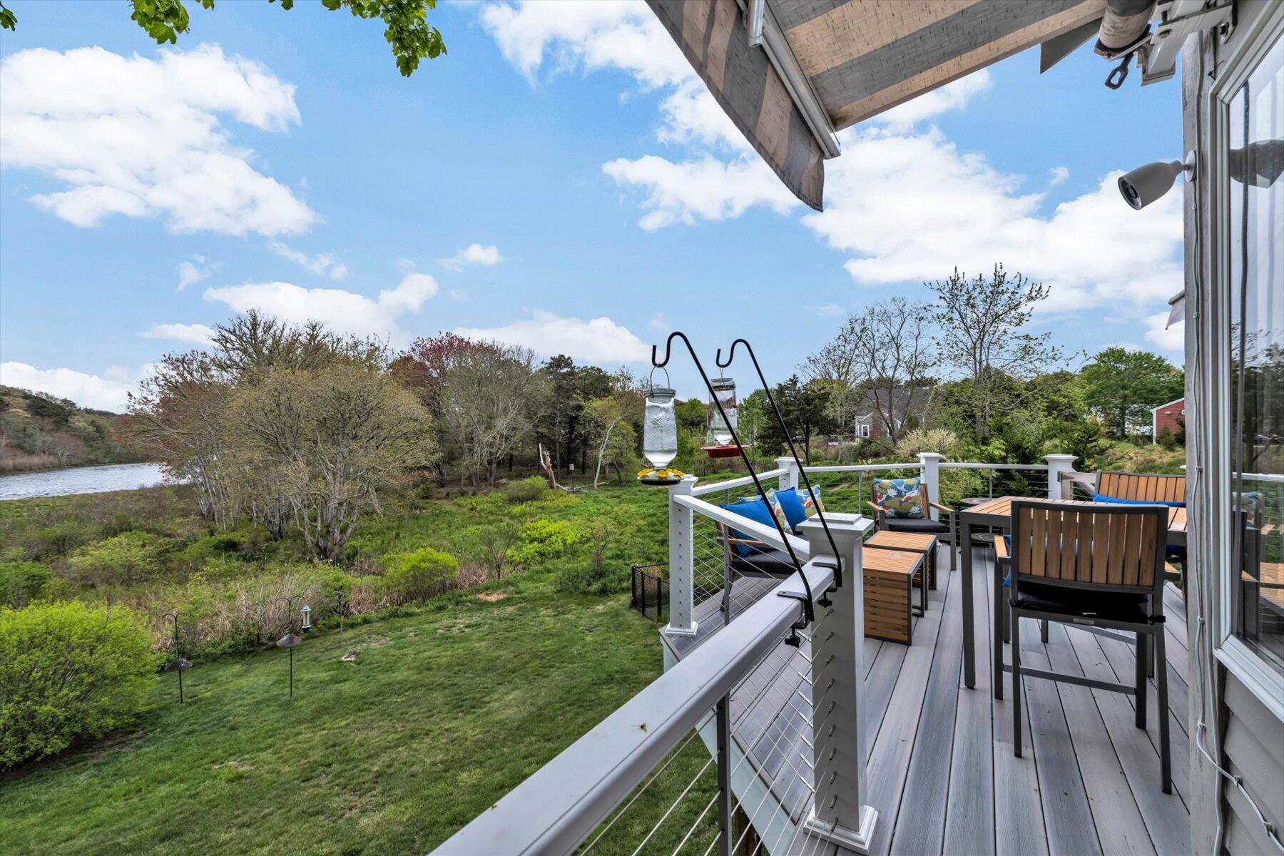 597 Orleans Road North Chatham, MA 02650 - Photo 16 of 76 Deck off living room and awning