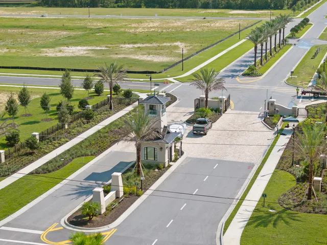 a view of a swimming pool with a yard