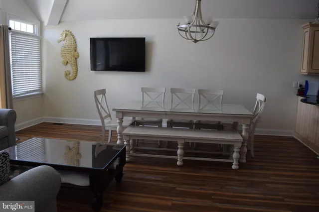 a view of a workspace with furniture