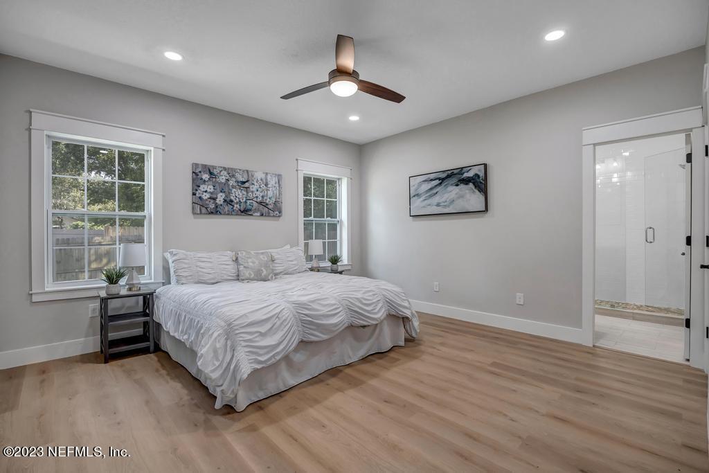 1281 Glen Laura Road Jacksonville, FL 32205 - Photo 16 of 33 a bedroom with a large bed and a window