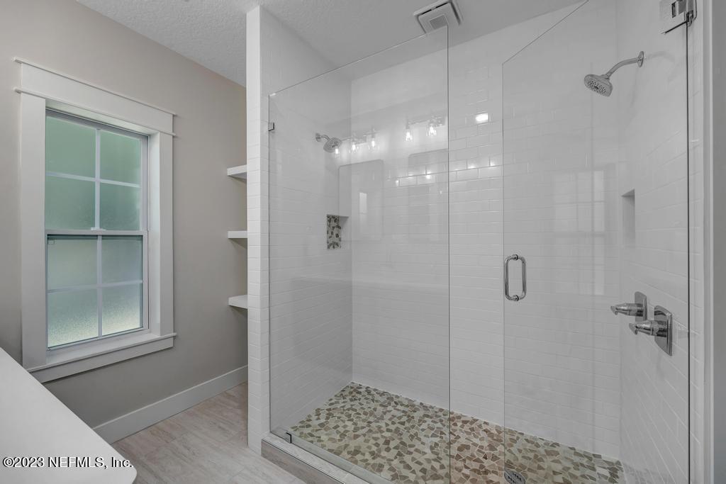 1281 Glen Laura Road Jacksonville, FL 32205 - Photo 20 of 33 a bathroom with a shower