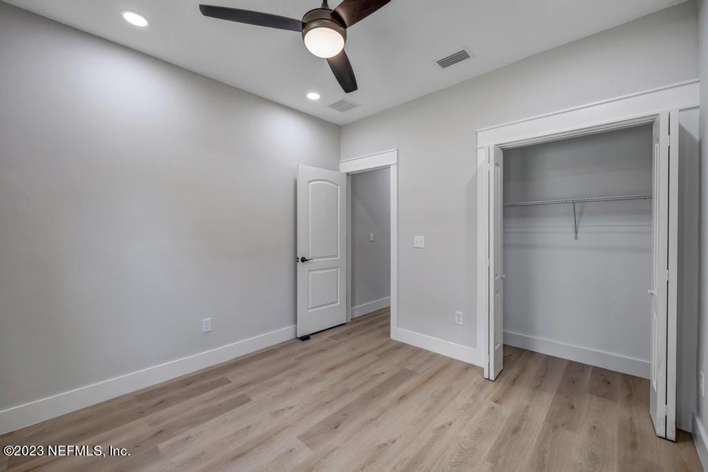 1281 Glen Laura Road Jacksonville, FL 32205 - Photo 27 of 33 wooden floor in an empty room