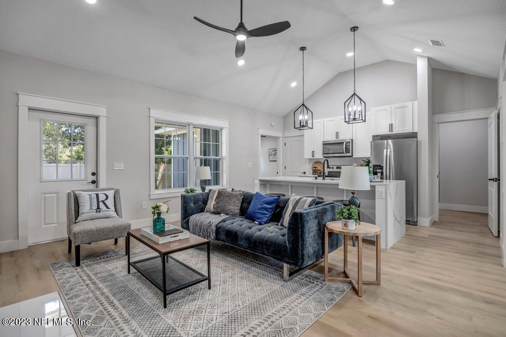 1281 Glen Laura Road Jacksonville, FL 32205 - Photo 6 of 33 a living room with furniture and kitchen view