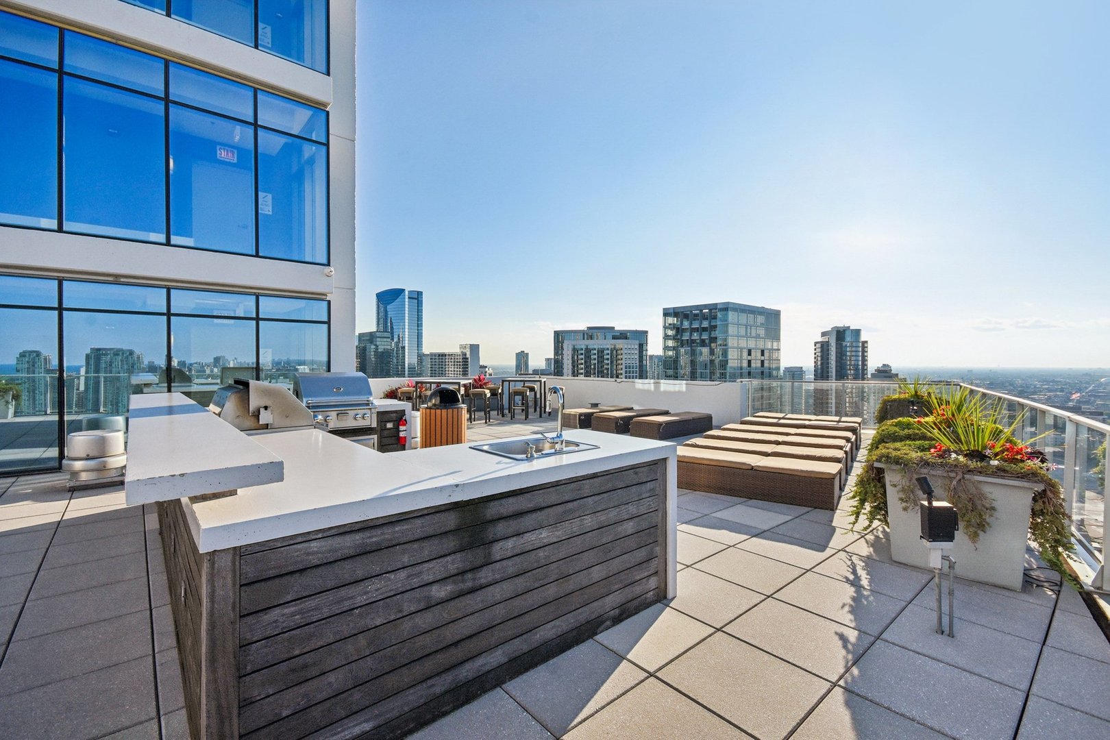 303 West Ohio Street, Unit 3309 Chicago, IL 60654 - Photo 21 of 23 a room with furniture a rug and white walls