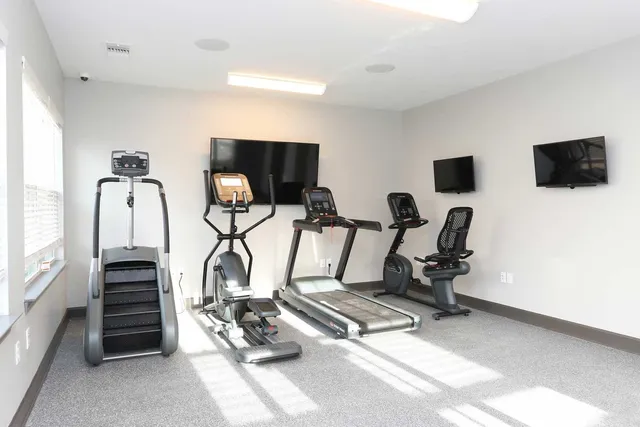a view of a room with gym equipment