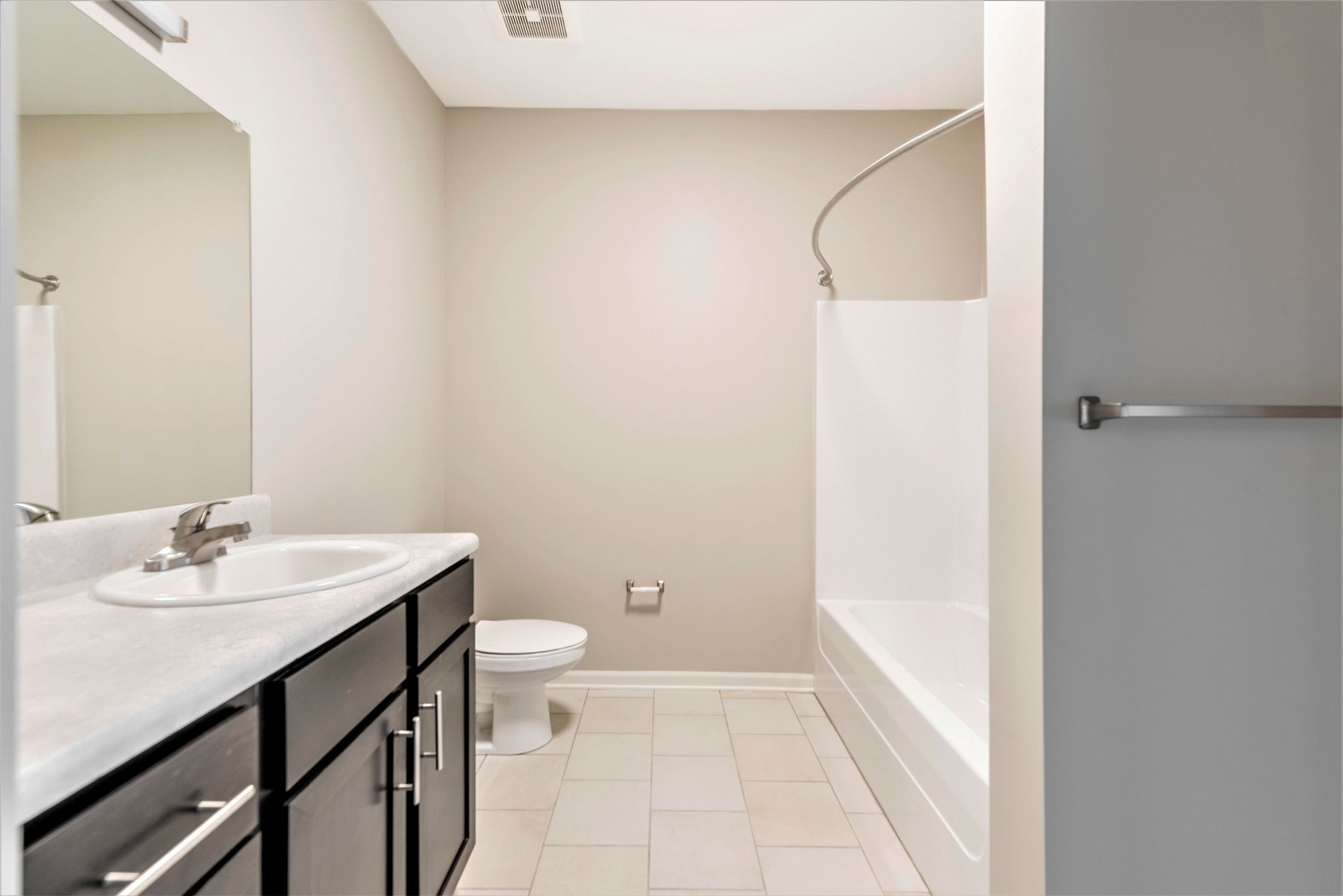 1253 McCawley Road Other, KY 40219 - Photo 9 of 13 a bathroom with a sink a toilet and shower