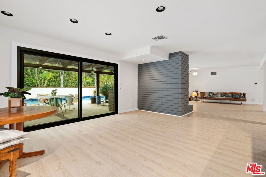 3135 Chandelle Road Los Angeles, CA 90046 - Photo 10 of 29 a view of a livingroom with furniture and floor to ceiling window
