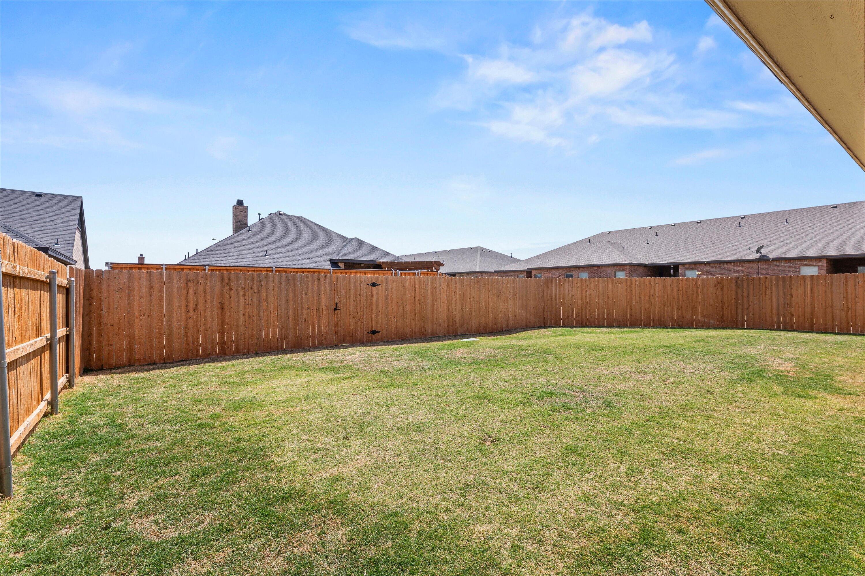 5719 116th Street Lubbock, TX 79424 - Photo 28 of 31 a view of a backyard