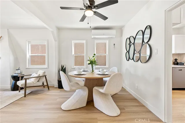 a kitchen with cabinets and window