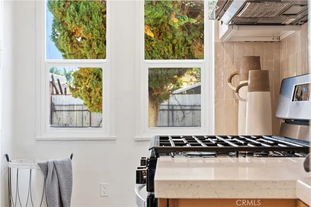 a bed room with a bed and a window