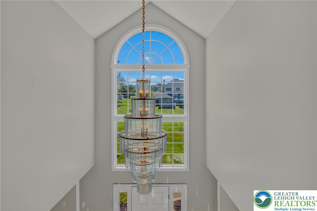 630 Clearfield Road Nazareth, PA 18064 - Photo 43 of 100 Soaring ceilings and an arched palladian window frame the formal entry foyer.