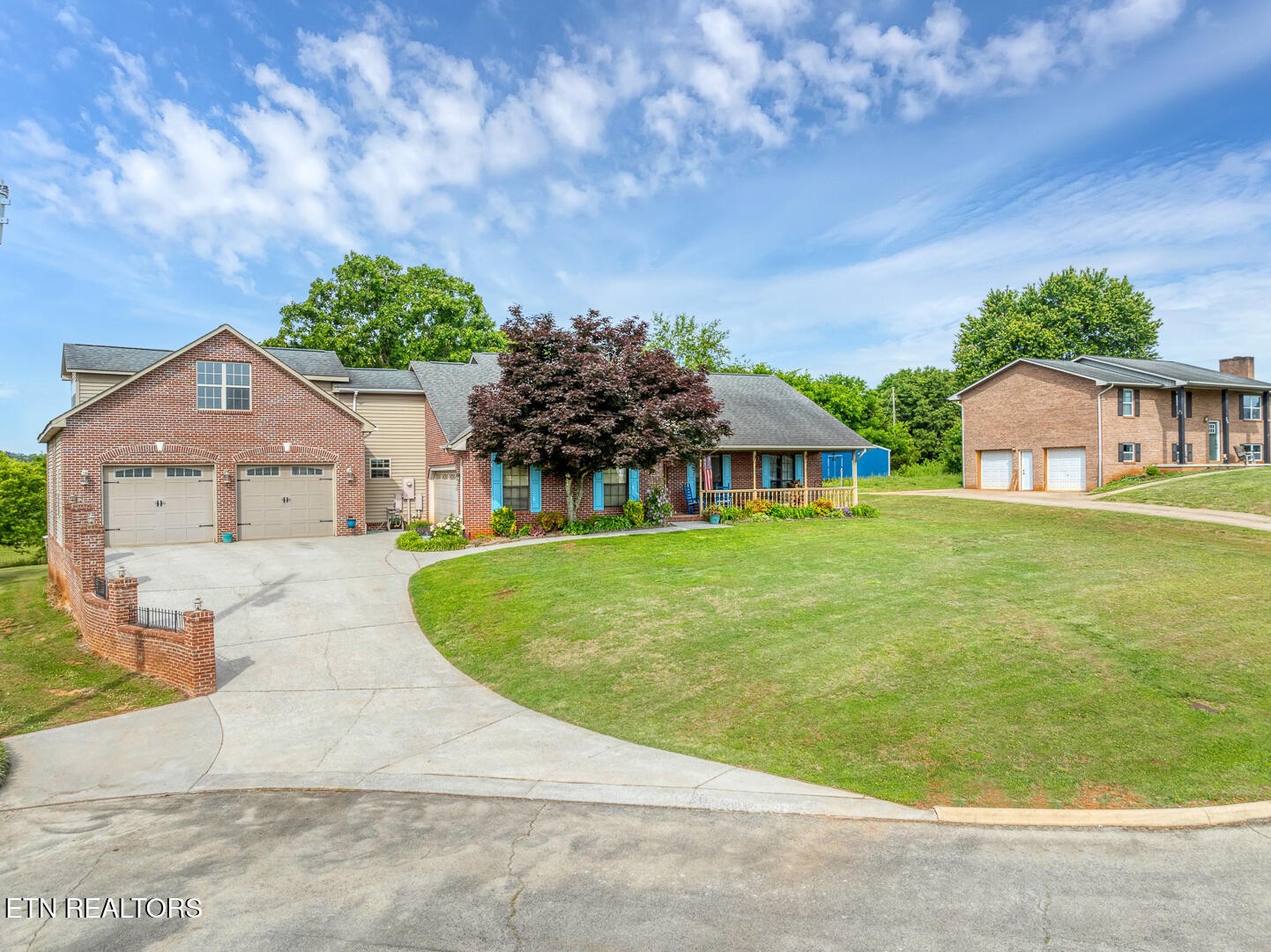 449 Foss Road Maryville, TN 37801 - Photo 2 of 49 a front view of a house with garden