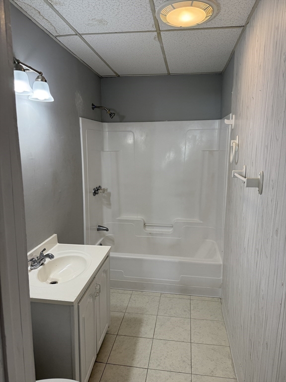 218 Vernon Street, Unit 2 Worcester, MA 01607 - Photo 16 of 19 a bathroom with a sink a toilet and shower