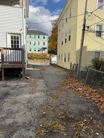 a view of a back yard of the house