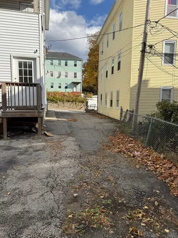 a view of a back yard of the house
