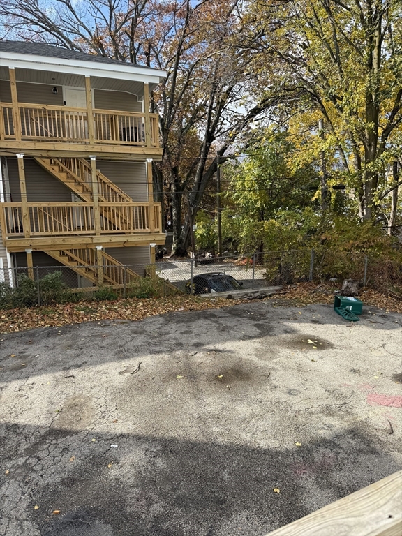 218 Vernon Street, Unit 2 Worcester, MA 01607 - Photo 19 of 19 a front view of a house with a yard