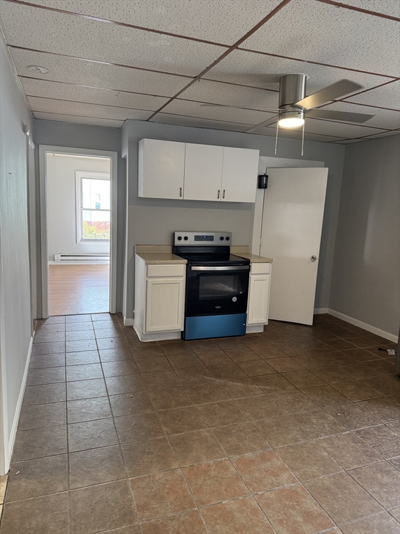 218 Vernon Street, Unit 2 Worcester, MA 01607 - Photo 8 of 19 a view of kitchen with refrigerator and stove