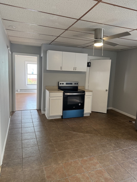 218 Vernon Street, Unit 2 Worcester, MA 01607 - Photo 9 of 19 a view of a kitchen with a sink dishwasher and a refrigerator