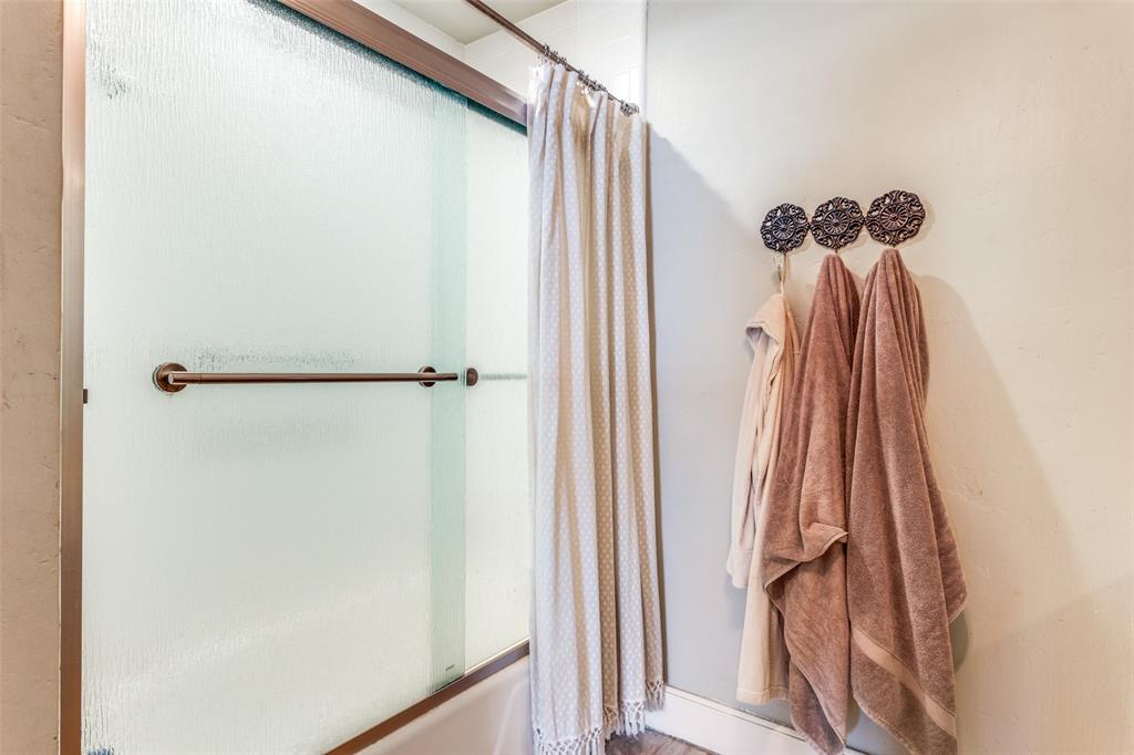 6353 Diamond Head Circle, Unit D Dallas, TX 75225 - Photo 20 of 25 a view of a walk in closet