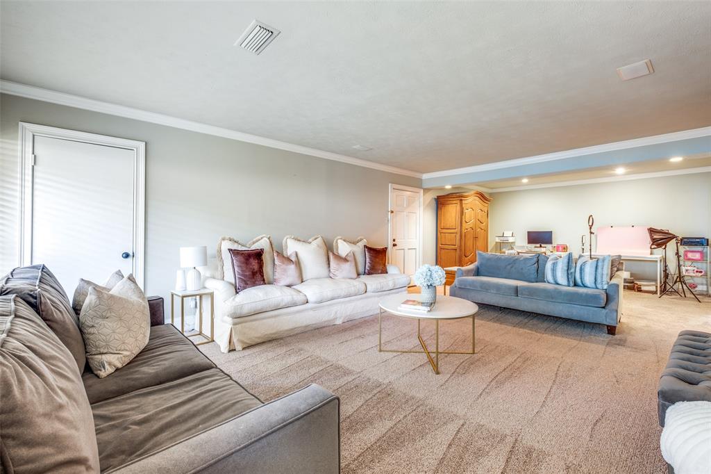 6353 Diamond Head Circle, Unit D Dallas, TX 75225 - Photo 6 of 25 a living room with furniture and a couch