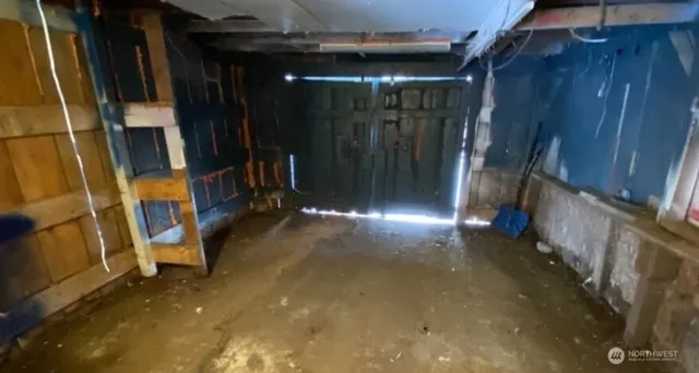 a kitchen with a refrigerator and a stove