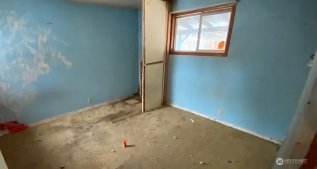 an empty room with windows