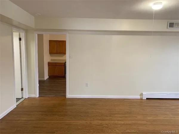 a view of an empty room and window