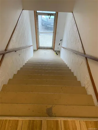 a view of hallway with stairs