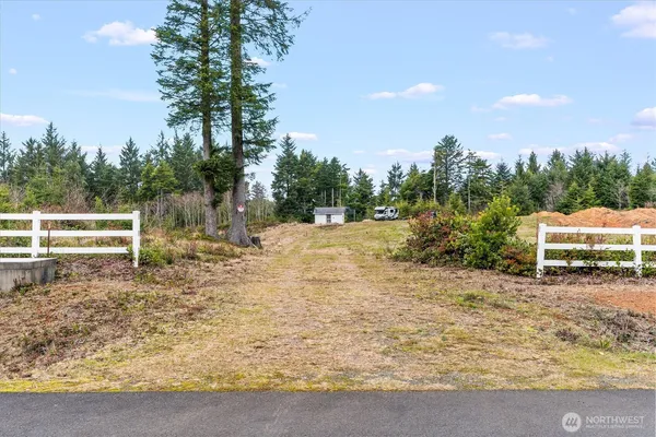 a view of backyard with green space
