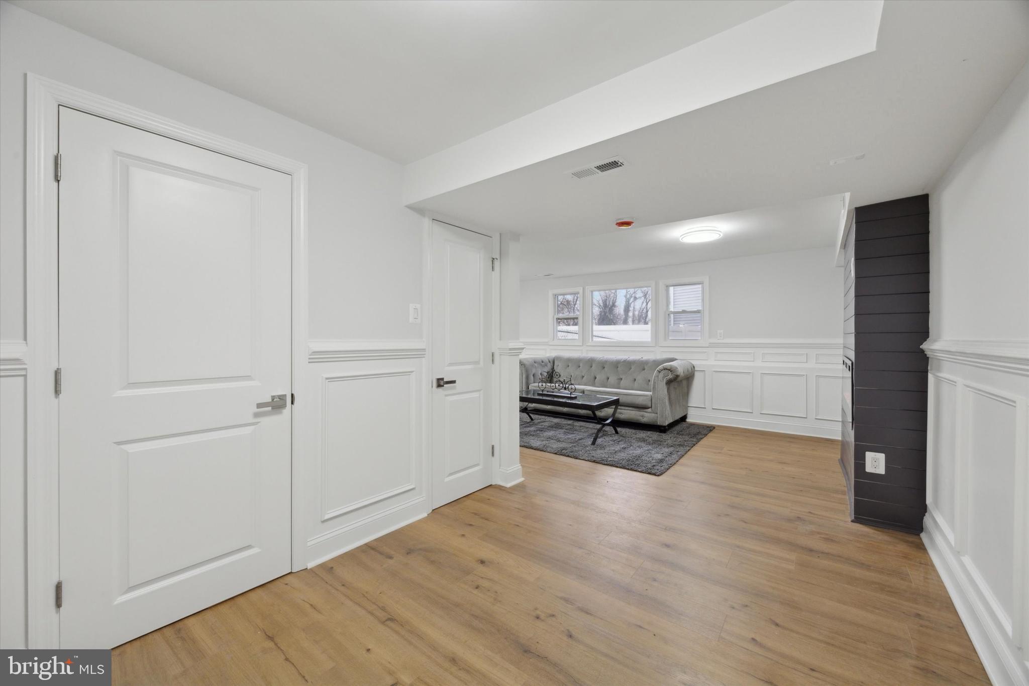 2124 Arleigh Road Cinnaminson, NJ 08077 - Photo 15 of 31 a living room with furniture and a wooden floor