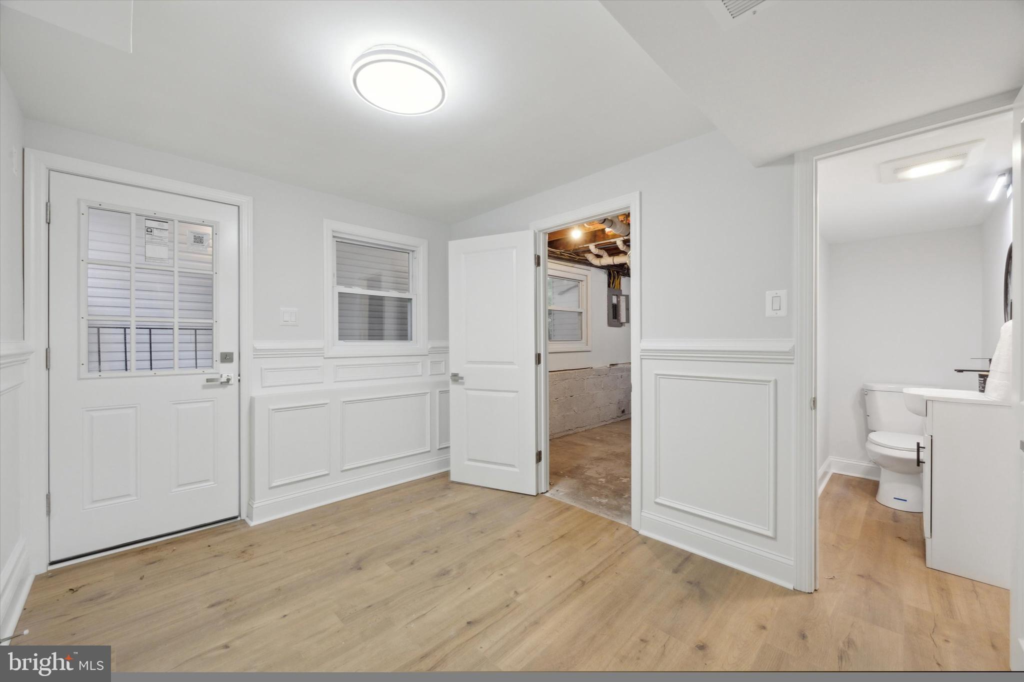 2124 Arleigh Road Cinnaminson, NJ 08077 - Photo 16 of 31 wooden floor with white cabinets and wooden floor